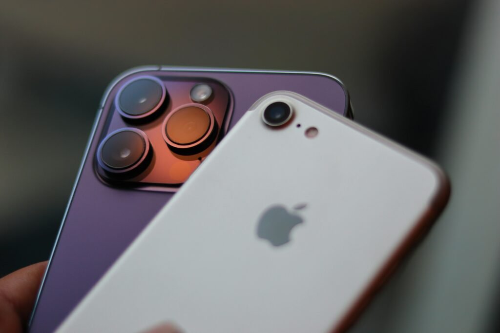 pexels-photo-17720330-17720330 Detailed image of two modern smartphones highlighting their camera lenses and design.